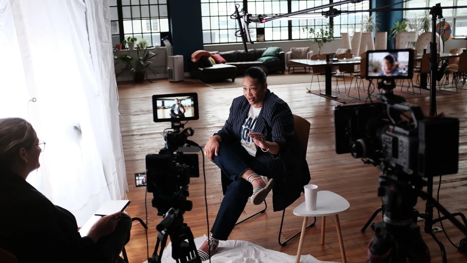 An interview in progress for the documentary series