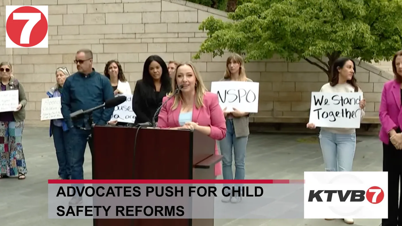 KTVB broadcast: Advocates push for child safety reforms, at a podium with supporters holding signs